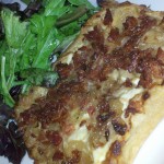 Alsace style caramelized onion tart, crisp smoked bacon bits, herb boursin,  goat and cottage cheeses