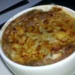 Onion soup with apple cider, cream, Gratinee with gruyere, ementhal cheeses